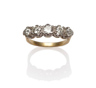 Lot 600 - A Diamond Five Stone Ring, the round brilliant cut diamonds in white claw settings to a yellow...