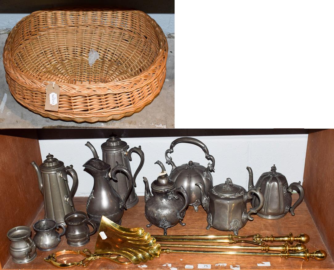 Lot 75 - A quantity of metalware's including Pewter, brass fire irons and a wicker basket (two shelves)