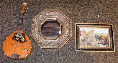 Lot 77 - An inlaid mandolin stamped Musima, oil on board signed C Evison depicting Wilmington Priory and...
