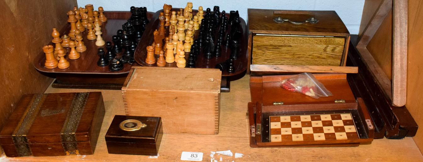 Lot 83 - A quantity of gaming counters and related items including wooden chess pieces, a travelling...