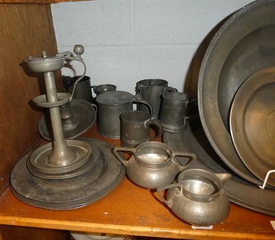 Lot 91 - A quantity of 18th century and later Pewter, to include a small plate engraved with a roundel...