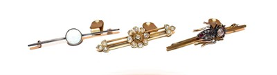 Lot 102 - A diamond and split pearl bar brooch, the central floral cluster formed of an old cut diamond...