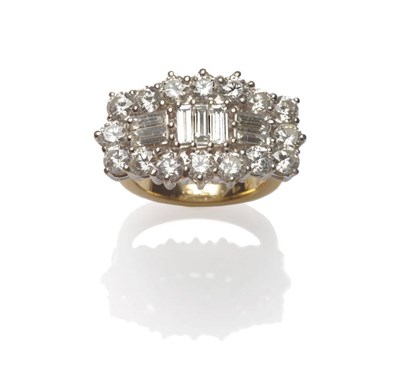 Lot 605 - An 18 Carat Gold Diamond Cluster Ring, a central arrangement of baguette cut diamonds within a...