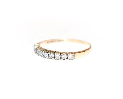 Lot 106 - A 9 carat gold diamond half hoop ring, finger size P