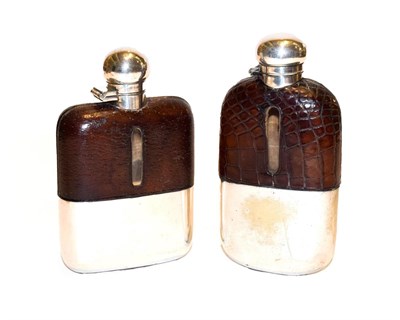 Lot 120 - Two early 20th century silver plated hip flasks, one mounted in crocodile skin and the other in...