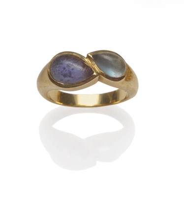 Lot 608 - An 18 Carat Gold Two Stone Twist Ring, by Cassandra Goad, in the deux poires style, a cabochon...