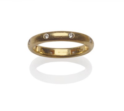 Lot 609 - An 18 Carat Gold Diamond Ring, by Cassandra Goad, the plain polished D shaped band set at intervals