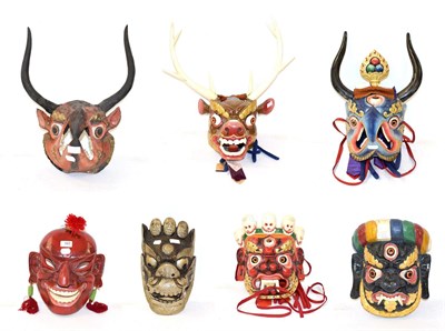 Lot 157 - A collection of seven miscellaneous masks, 20th century in date, including Butanese, Nepalese...