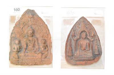 Lot 160 - Two Buddhist earthenware figural plaques, largest 17cm high on plastic stands (2)