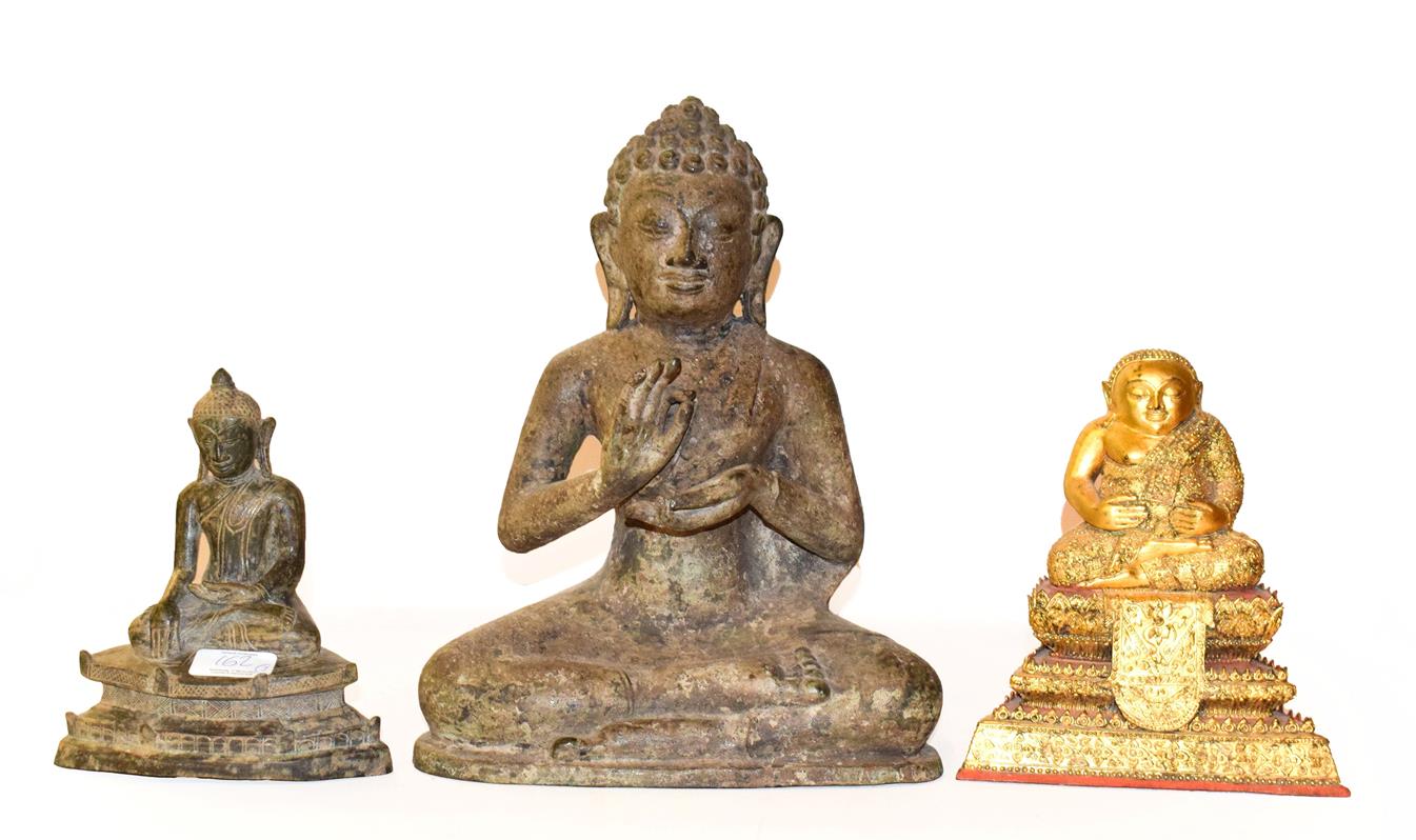 Lot 162 - A bronze figure of a seated Buddha, 33cm high together with a similar smaller bronze Buddha and...