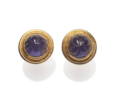 Lot 611 - A Pair of 9 Carat Gold Earrings, by Cassandra Goad, each with a domed purple stone carved with...