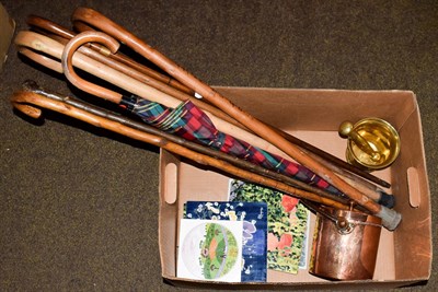 Lot 175 - Antique brass pestle and mortar, a similar copper vessel, a quantity of walking sticks and assorted