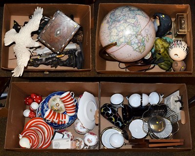 Lot 177 - Four boxes of assorted items to include a modern desk globe, composite figures and a Paragon...