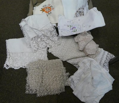 Lot 178 - Five boxes of assorted 20th century lace and linen, embroidered linen, two boxes of new white...