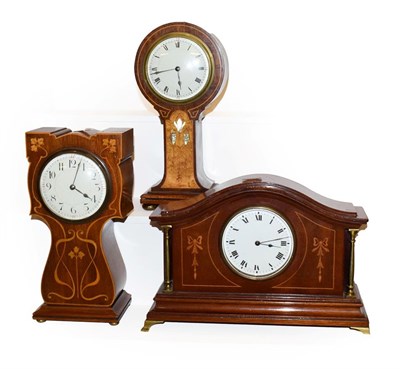 Lot 218 - Three Edwardian mahogany inlaid timepieces