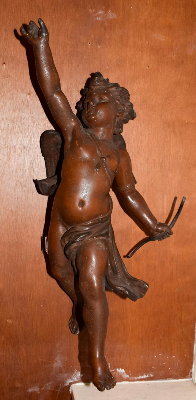 Lot 226 - A 19th century spelter figure of a winged Putto, 47cm