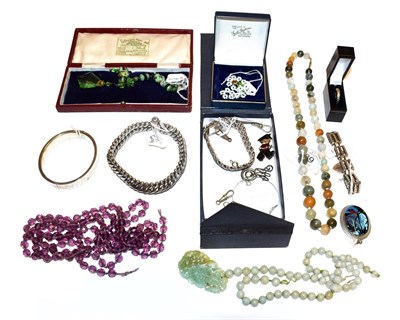 Lot 229 - A quantity of costume jewellery including a silver gatelink bracelet, fastenings, an amethyst...