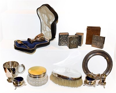 Lot 234 - A collection of assorted silver to include a silver and enamel mounted cut-glass dressing-table...
