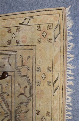 Lot 1072 - A Melas carpet, the narrow field of cruciform devices enclosed by multiple borders, 323cm by 202cm