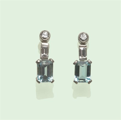 Lot 626 - A Pair of Diamond and Aquamarine Earrings, a round brilliant cut diamond in a white millegrain...