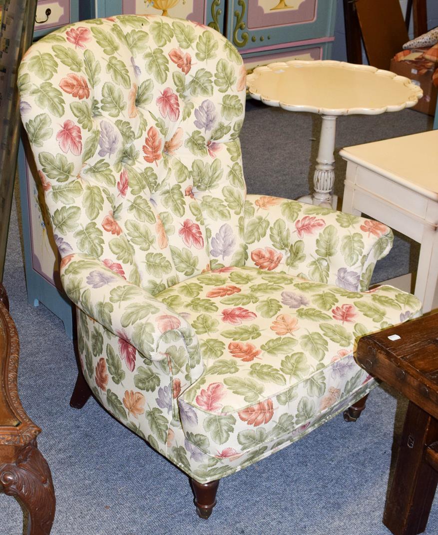 Lot 1092 - A Liberty & Co. button back occasional chair, the fabric printed with autumnal leaves