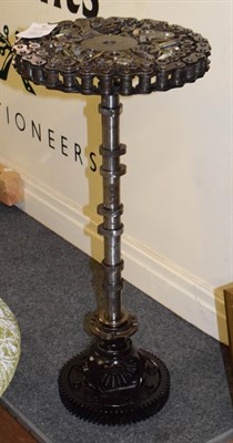 Lot 1101 - A Steampunk Industrial metal tripod table, constructed using various industrial sprockets,...