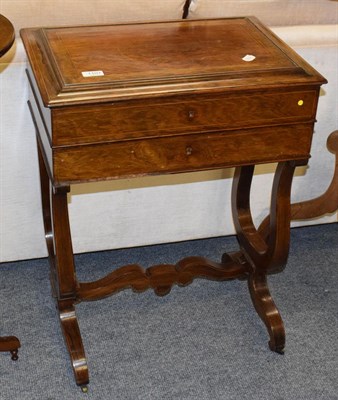 Lot 1107 - A 19th century inlaid rosewood work table, the shallow caddy form hinged lid fitted with a...