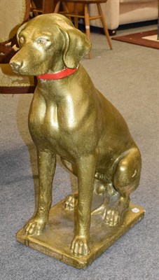 Lot 1114 - A gilt painted composition model of a seated hound, height 75cm