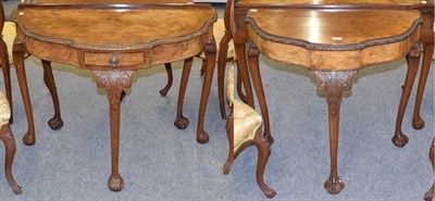 Lot 1115 - Two walnut shaped demi lune side tables, one fitted with a drawer, 101cm by 52cm by 77cm, the other