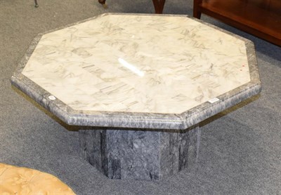 Lot 1117 - An octagonal reconstituted marble coffee table, 93cm by 43cm high