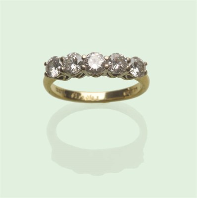 Lot 630 - An 18 Carat Gold Five Stone Ring, by Boodle and Dunthorne, the diamonds in white claw settings,...