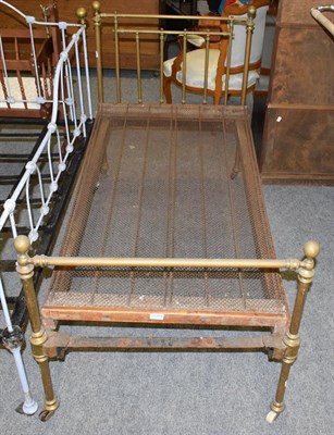 Lot 1129 - A Victorian brass small child's bed 150cm by 75cm