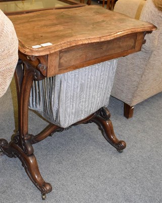 Lot 1141 - A Victorian rosewood sewing table, 70cm by 45cm by 73cm