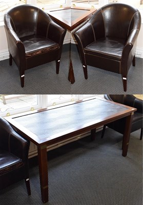Lot 1173 - A faux reptile skin inset table, 153cm by 76cm by 74cm together with a pair of faux leather tub...