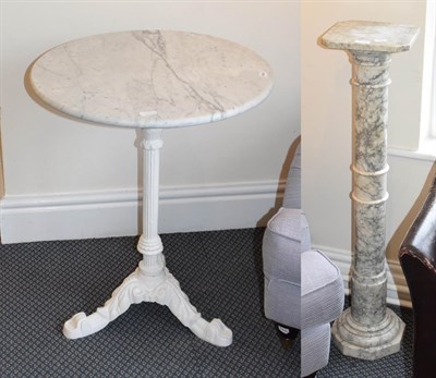 Lot 1174 - A reconstituted marble torchere, 98cm high together with a painted cast iron table base with...
