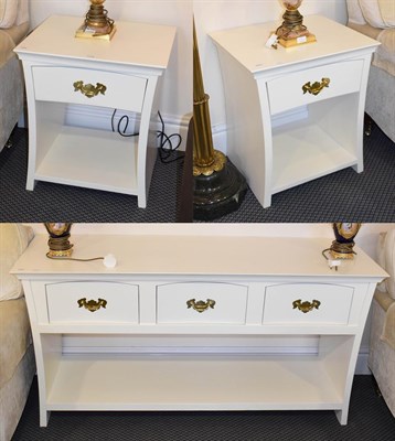 Lot 1178 - A white painted modern three drawer waisted sideboard with a pot board stretcher 150cm by 50cm...