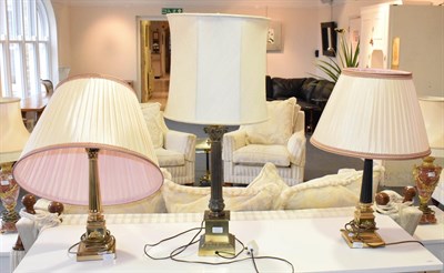 Lot 1183 - A near pair of Corinthian column table lamps, each with tapering fluted columns, 53cm including...