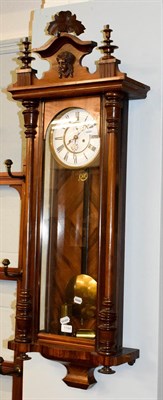 Lot 1194 - A Vienna type double weight driven wall clock, circa 1890, 115cm high