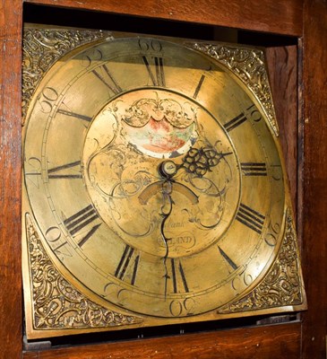 Lot 1202 - A carved oak thirty hour longcase clock, the square brass dial signed Ewbank, Elland