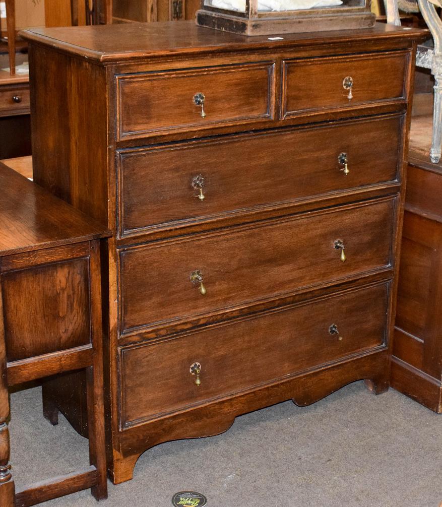 Lot 1225 - An 18th century style oak straight-front four-height chest of drawers, 107cm by 48cm by 118cm