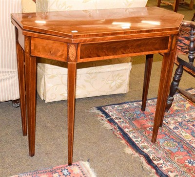 Lot 1241 - A 19th century mahogany inlaid fold-over card table, 91cm by 45cm by 73cm