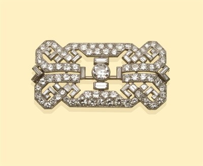 Lot 642 - A Diamond Plaque Brooch, by Cartier, round brilliant cut and baguette cut diamonds in white...