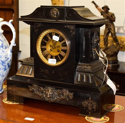 Lot 1254 - A large Victorian black slate striking mantel clock, dial centre with visible Brocot...