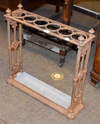 Lot 1278 - Victorian Coalbrookdale iron stick stand with original tray, 65cm by 19cm, 64cm high