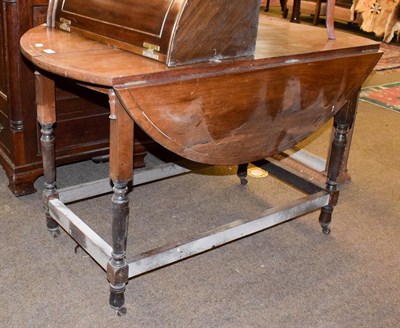 Lot 1280 - A 19th century rosewood drop leaf table with brass inlay, raised on turned supports, 115cm by 113cm