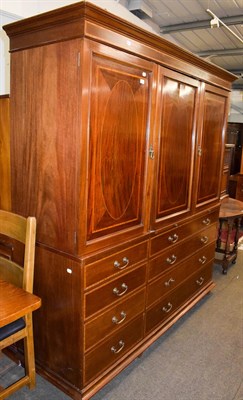 Lot 1294 - An early 20th century inlaid mahogany triple wardrobe, 193cm by 62cm by 208cm
