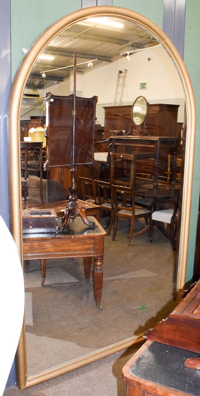 Lot 1306 - A Large Victorian gilt framed arch top mirror, 150cm by 237cm