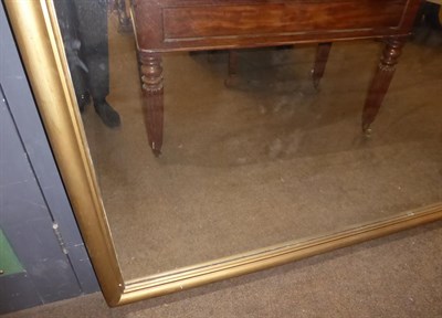 Lot 1306 - A Large Victorian gilt framed arch top mirror, 150cm by 237cm