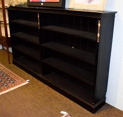 Lot 1310 - An ebonized open bookcase with adjustable shelves 227cm by 32cm by 127cm