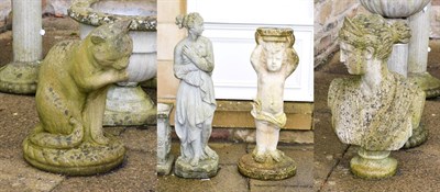 Lot 1332 - A group of four composition garden statues, one in the form of a classical maiden 112cm, another in